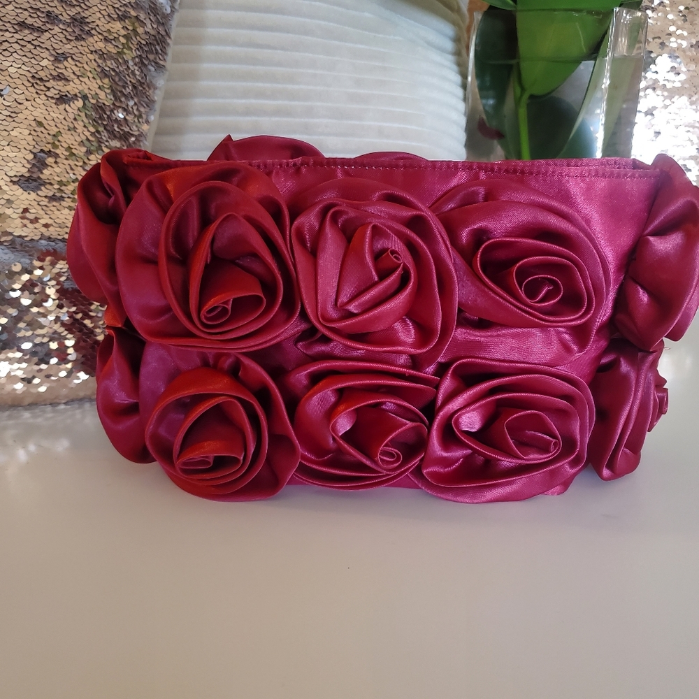 Satin Rose patterned clutch handbag